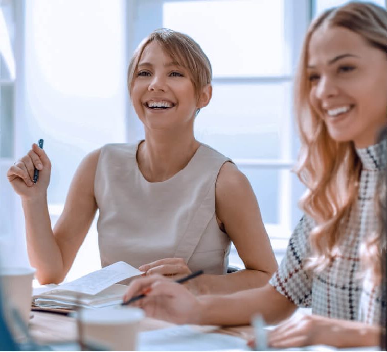 Young business woman sitting office desk